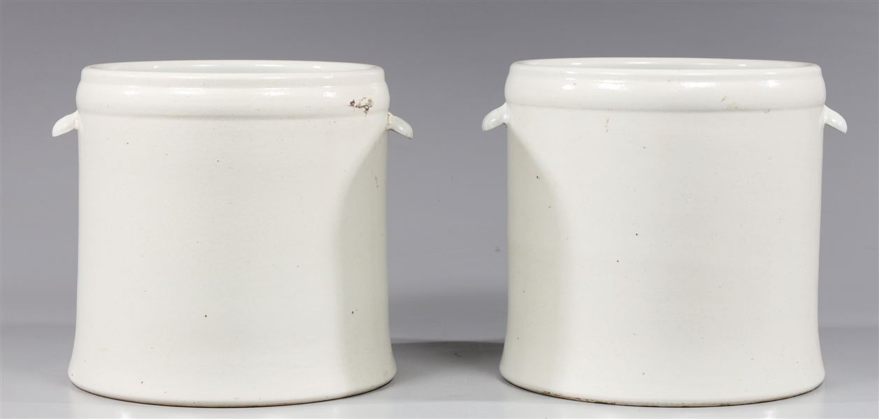 Appraisal: Pair of Chinese white glazed porcelain planters each with flared