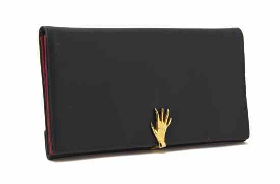 Appraisal: A Gucci Black and Red Leather Wallet goldtone hand motif