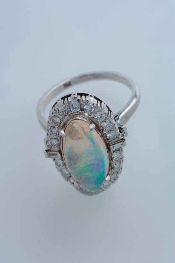 Appraisal: JELLY OPAL DIAMOND AND PLATINUM RING Vintage opal diamond and