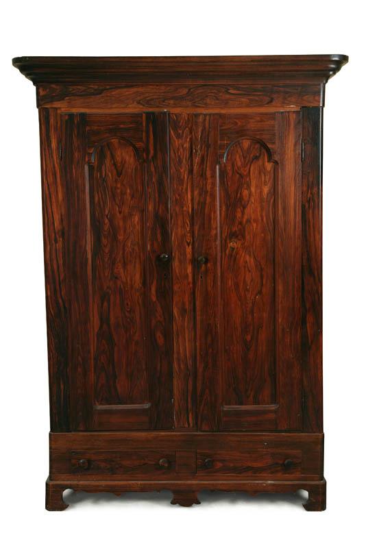 Appraisal: WARDROBE Grain decorated with a molded cornice paneled doors two