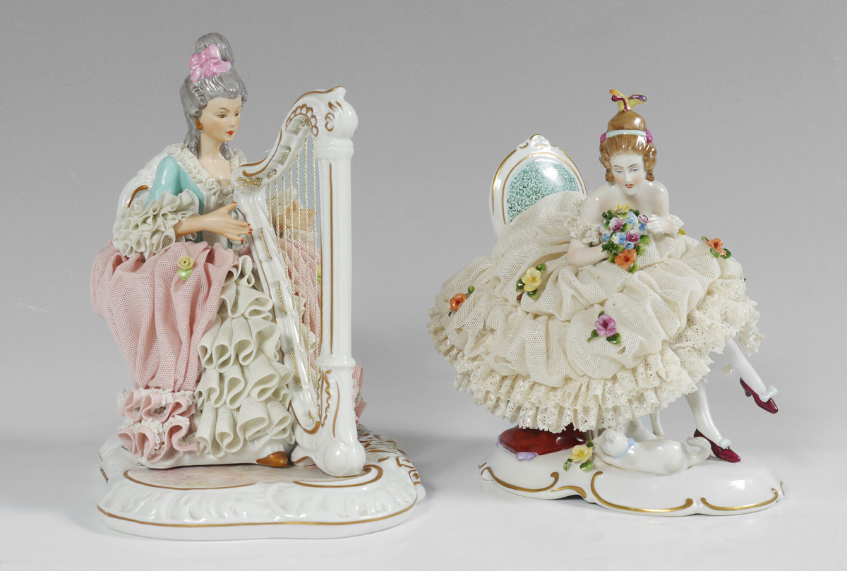 Appraisal: GERMAN LACY PORCELAIN FIGURINES To include Sandizell figure of a