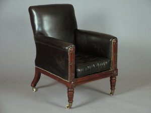 Appraisal: A Regency mahogany armchair the black leather upholstery fixed in