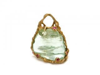 Appraisal: A FREE FORM AQUAMARINE PENDANT In the style of designer