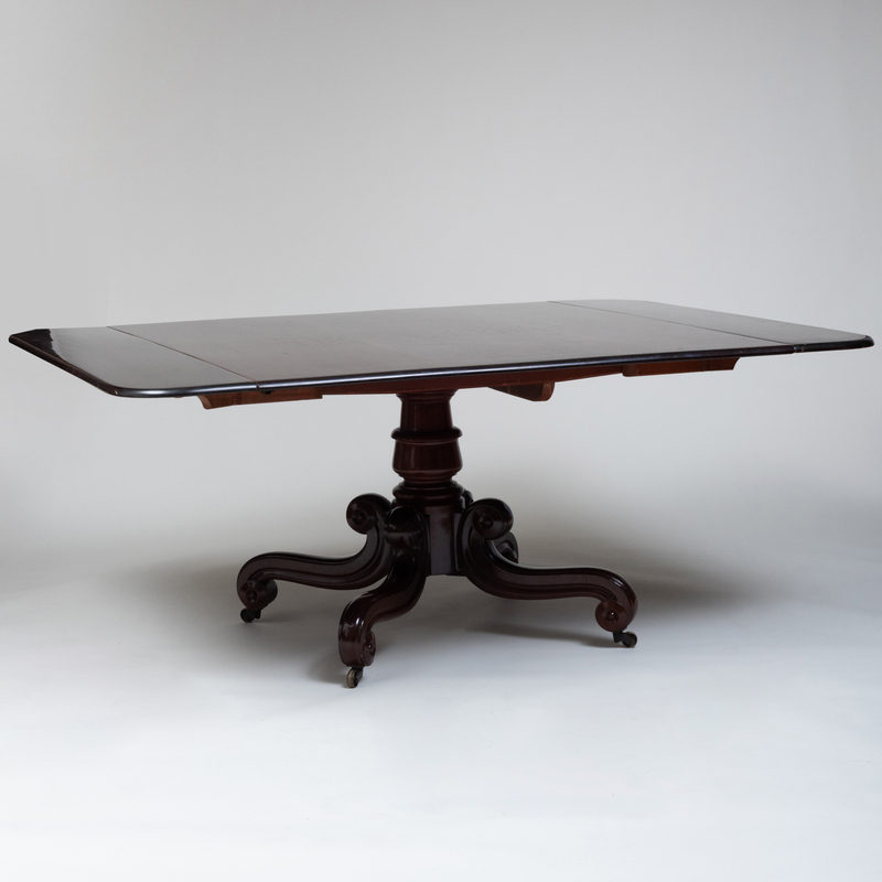 Appraisal: Regency Mahogany Extension Dining Table Raised on casters fitted with