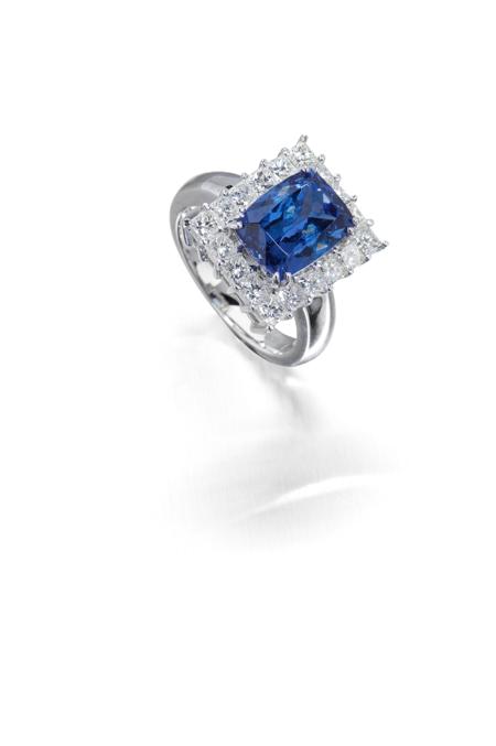 Appraisal: An ct white gold mounted Tanzanite and diamond cluster ring