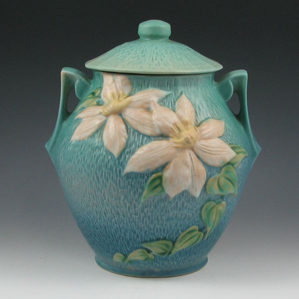 Appraisal: Roseville Clematis cookie jar with lid in blue Marked Roseville