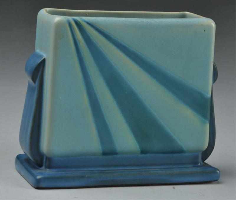 Appraisal: Roseville Futura Blue Sunray Pillow Vase Description Shape - -