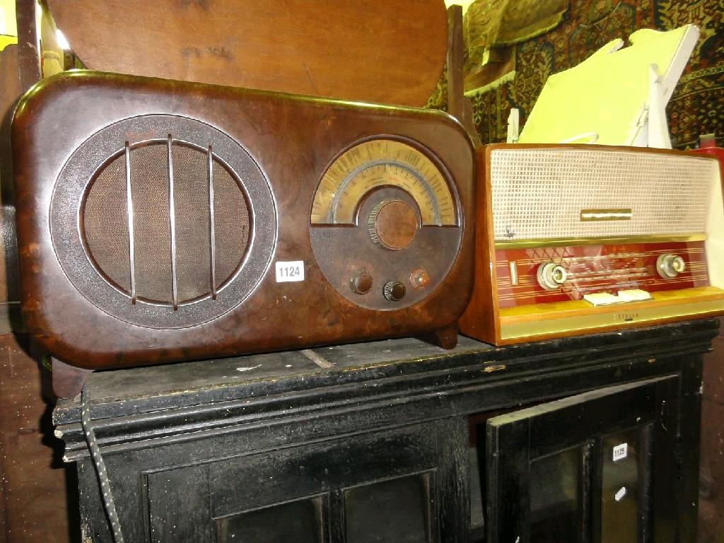 Appraisal: An Eco vintage radio with bakelite case and circular dials