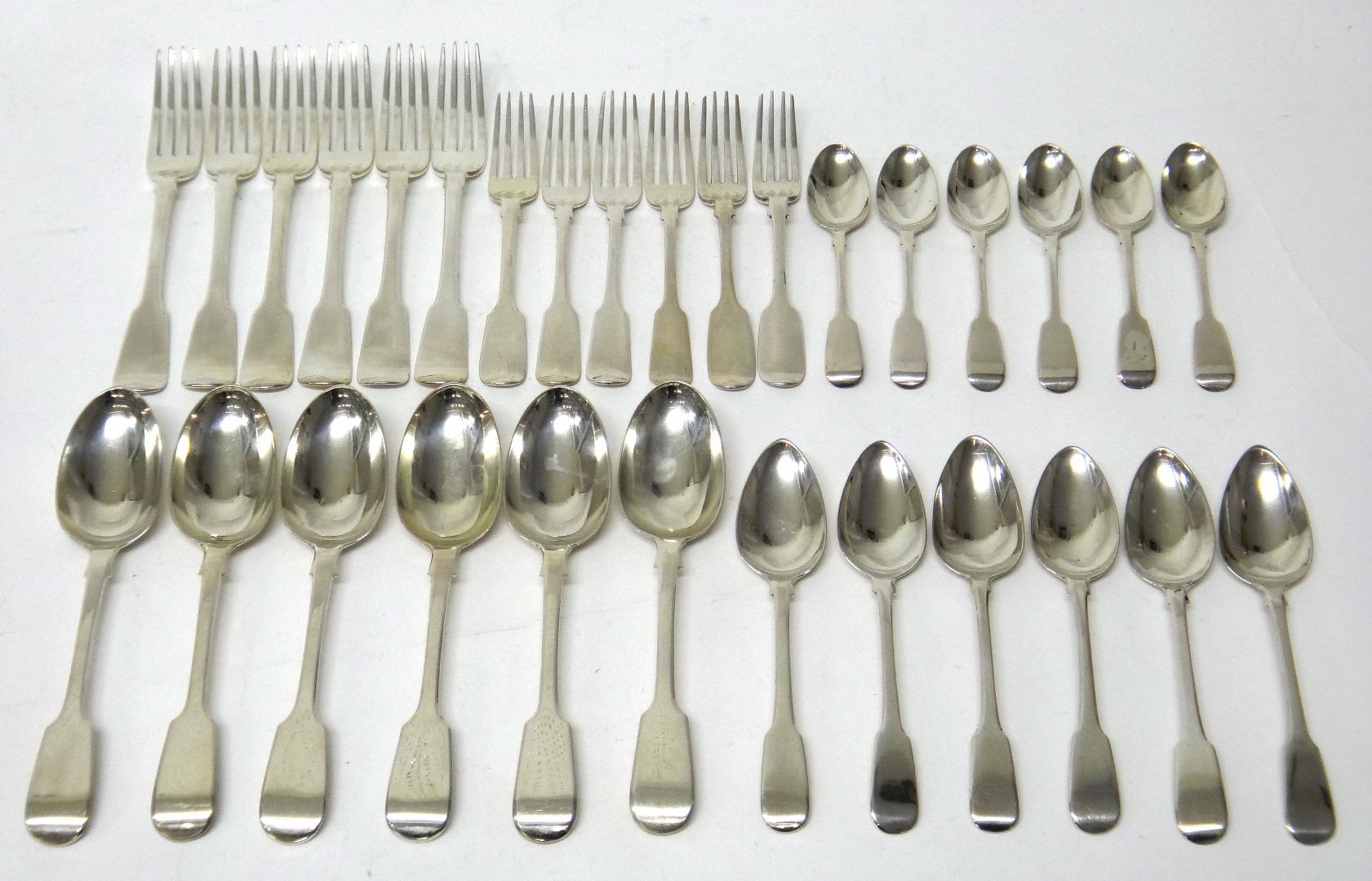 Appraisal: Silver fiddle pattern table flatware comprising three table spoons London