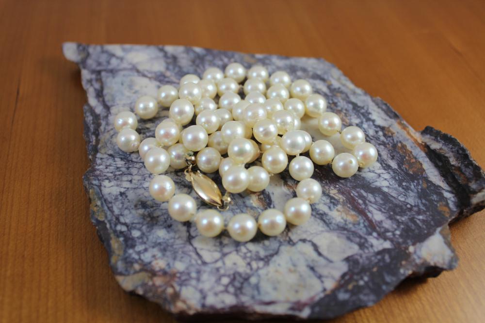 Appraisal: MATINEE LENGTH PEARL AND FOURTEEN KARAT GOLD NECKLACE - in