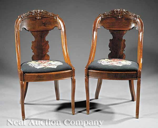 Appraisal: A Pair of American Classical Revival Carved Mahogany Gondola Chairs