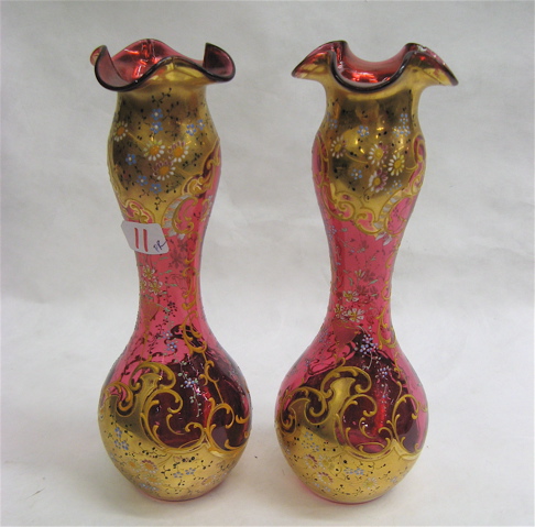 Appraisal: PAIR CRANBERRY ENAMELED VASES c pinched waists and bulbous bases