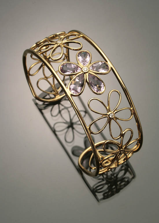 Appraisal: -Karat Yellow-Gold Amethyst and Diamond Bangle Bracelet The floral wire