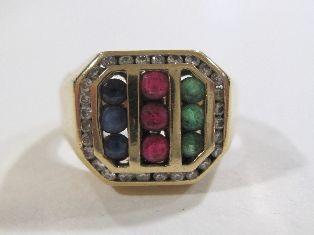 Appraisal: Fourteen carat gold dress ring set with rubies emeralds sapphires