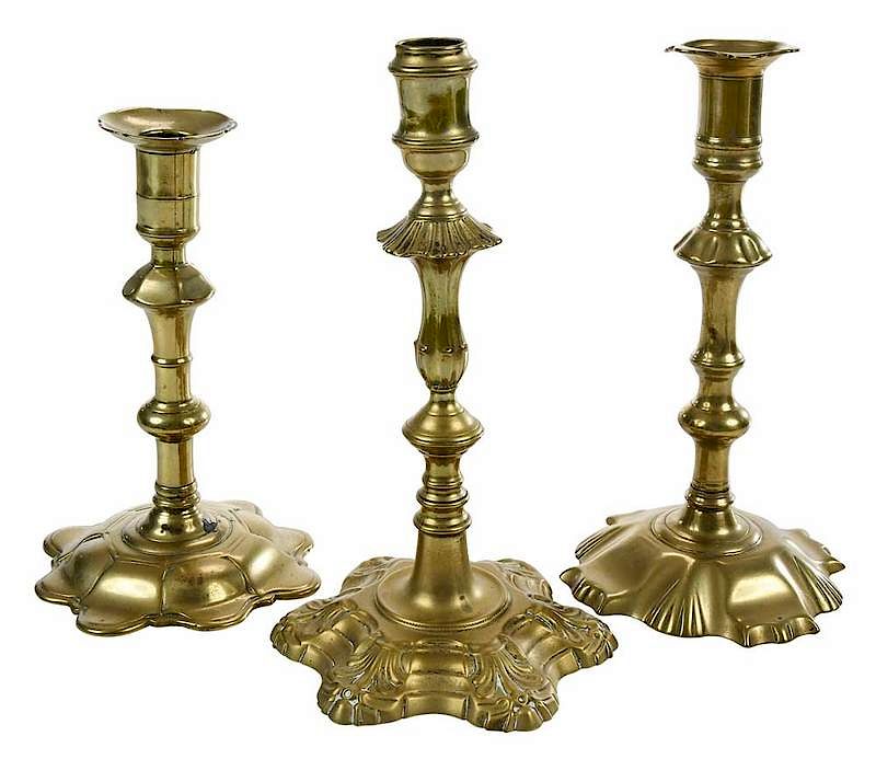 Appraisal: Three Fine Georgian Candlesticks British th century one petal form