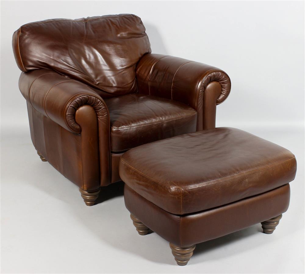 Appraisal: CRATE BARREL BROWN LEATHER CLUB CHAIR AND OTTOMAN EN SUITE