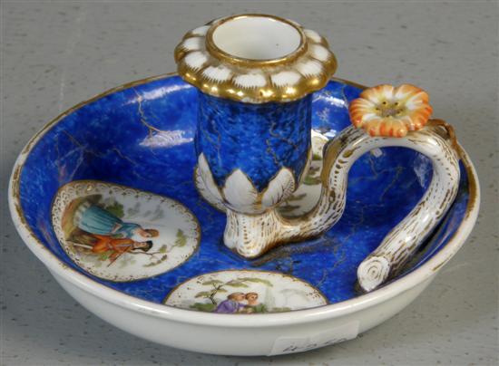 Appraisal: Meissen porcelain chamber-stick the blue ground painted with panels of