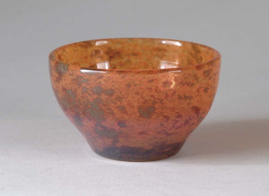 Appraisal: DAUM NANCY BOWL Mottled orange and amethyst glass signed Daum