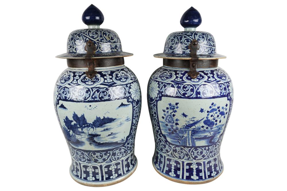 Appraisal: PAIR OF CHINESE IRON MOUNTED BLUE WHITE PORCELAIN JARS inches