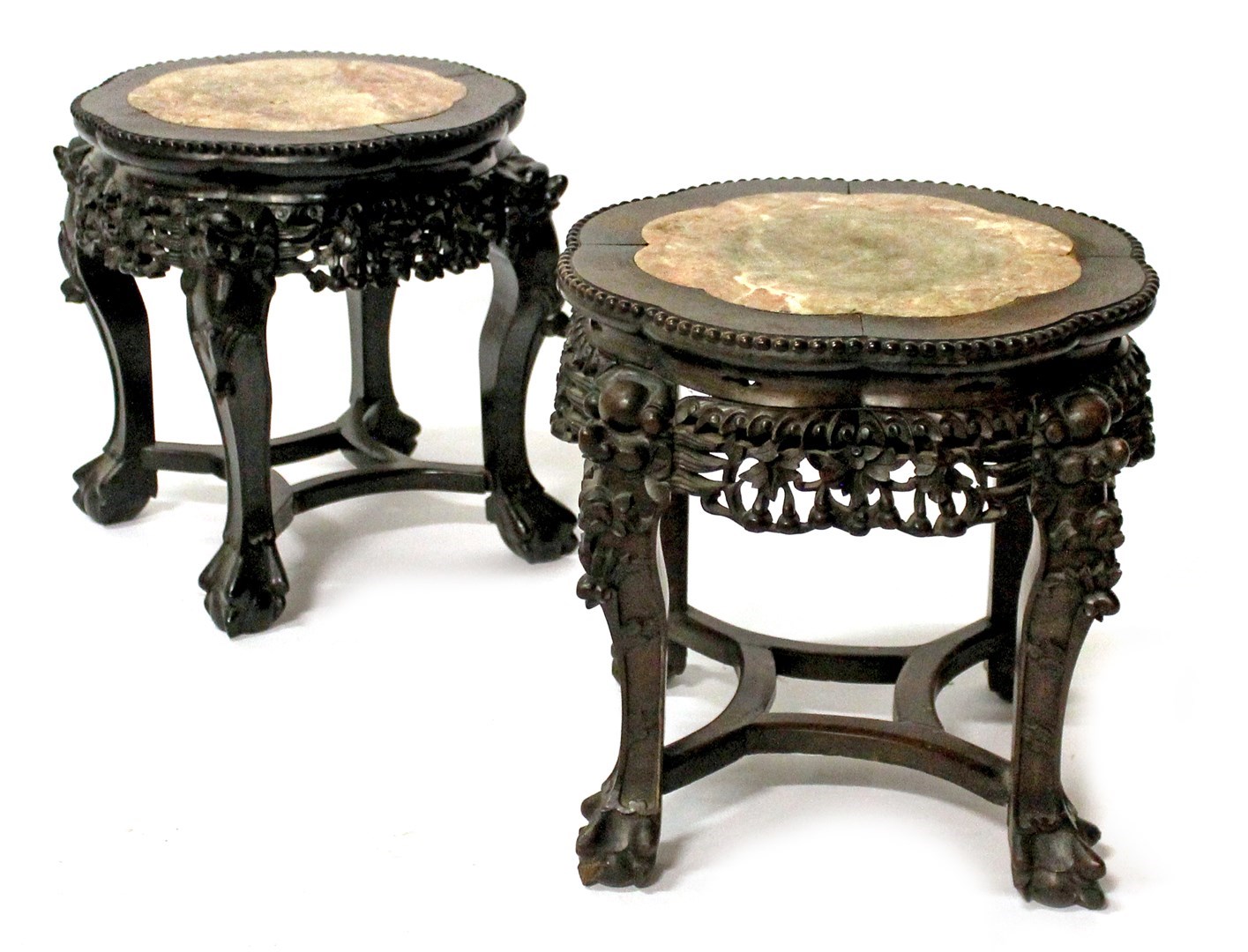 Appraisal: A near pair of Chinese urn stands each with shaped