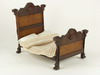 Appraisal: DOLL'S BED - Walnut and chestnut doll's bed circa with