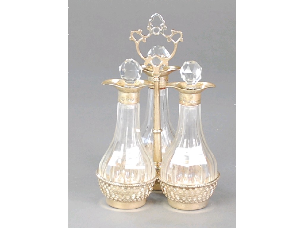 Appraisal: VICTORIAN PIERCED SILVER TREFOIL CRUET FRAME with raised centre handle