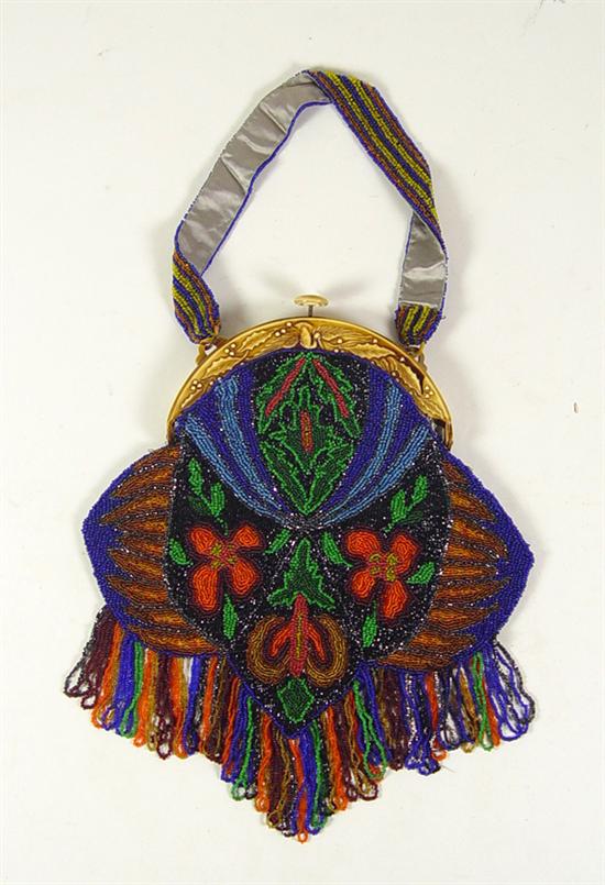 Appraisal: French Beaded Purse With designed molded plastic handle Tones of