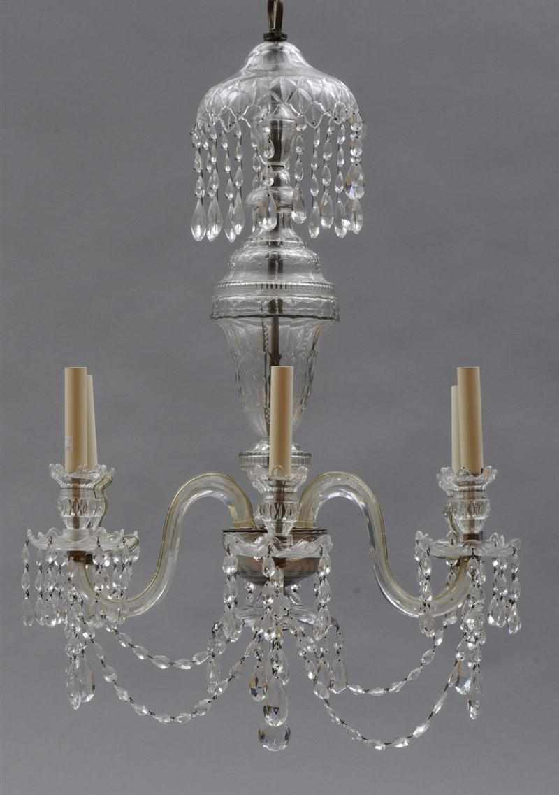 Appraisal: GEORGIAN STYLE SIX-LIGHT CRYSTAL CHANDELIER With a domed corona supporting