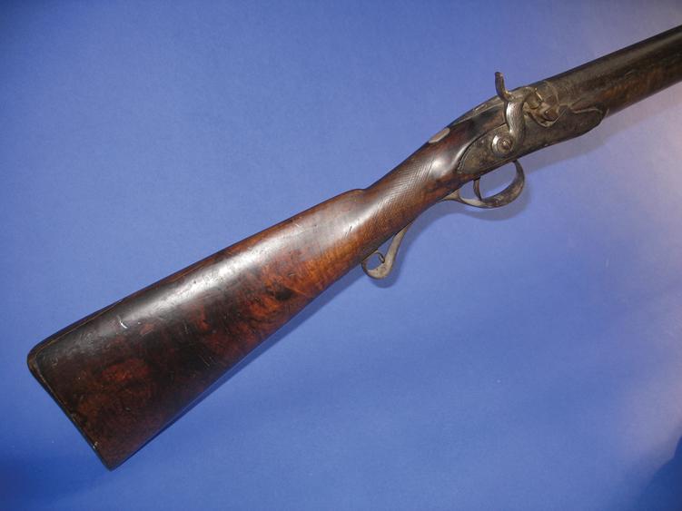 Appraisal: A SINGLE BARREL HAMMER ACTION MUSKET with percussion cap firing