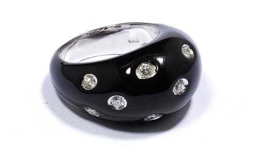 Appraisal: ENAMEL AND DIAMOND RING White gold Black enamelled convex band