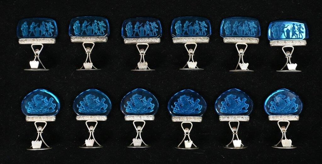 Appraisal: blue glass rectangles with a classical scene blue glass ovals