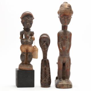 Appraisal: Three West African Figural Wood Carvings to include a seated