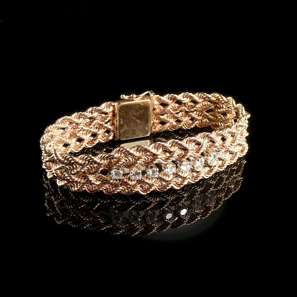 Appraisal: A K YELLOW GOLD AND DIAMOND LADY'S BRACELET A K