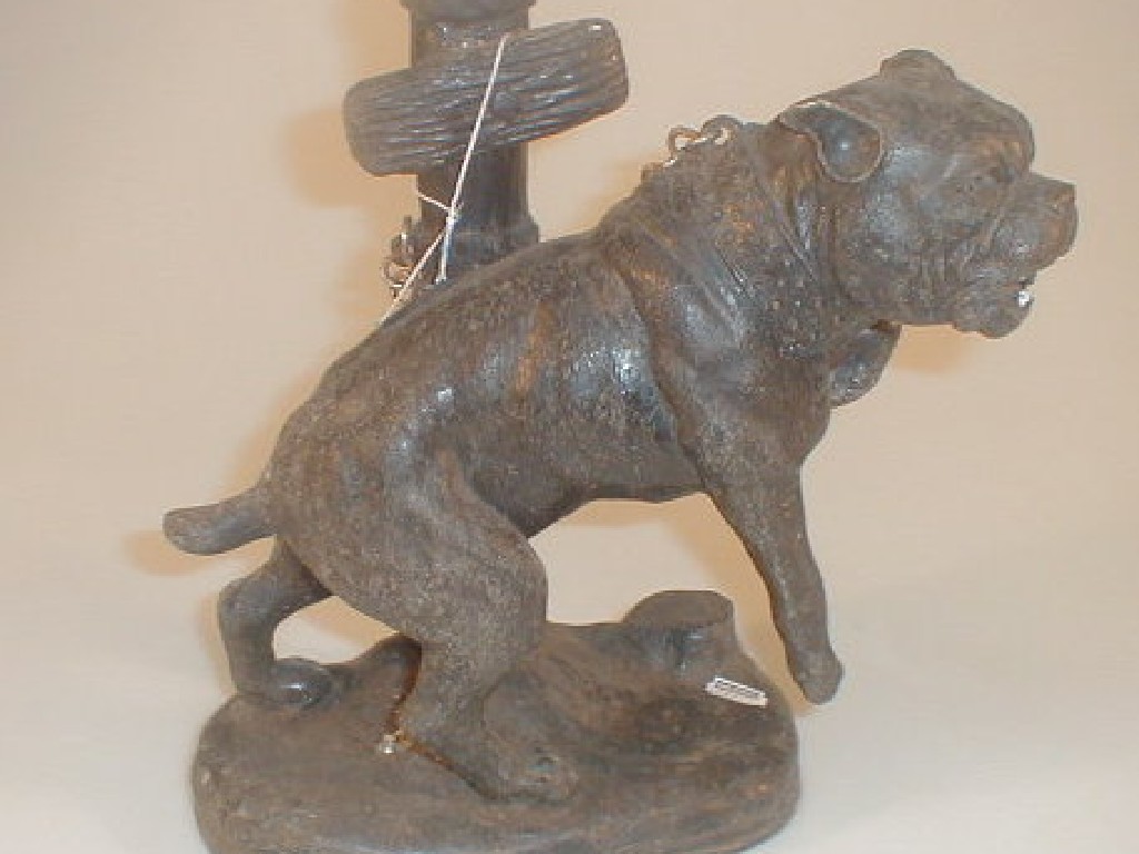 Appraisal: A dark brown patinated bronze figure of a snarling mastiff