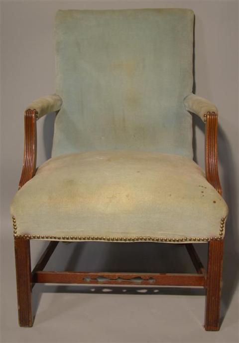 Appraisal: CHIPPENDALE STYLE LOLLING CHAIR with carved stretcher base and nail