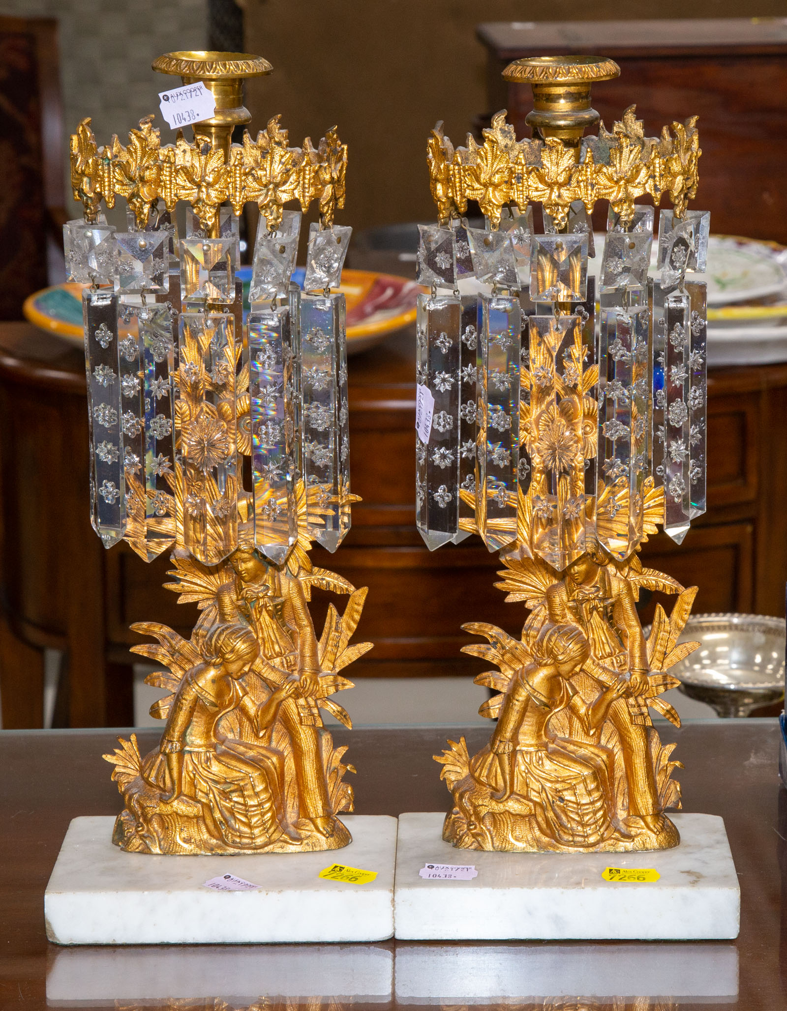 Appraisal: A PAIR OF ELIZABETHAN REVIVAL GARNITURE CANDLESTICKS American rd quarter