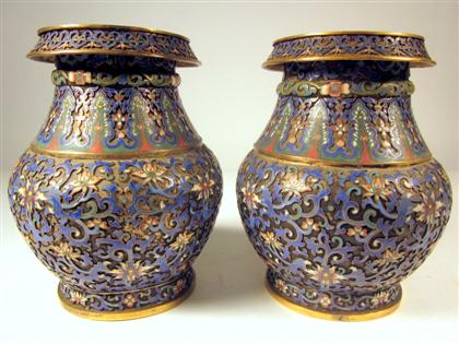 Appraisal: Pair of Chinese cloisonne enameled vasesBaluster form worked to show