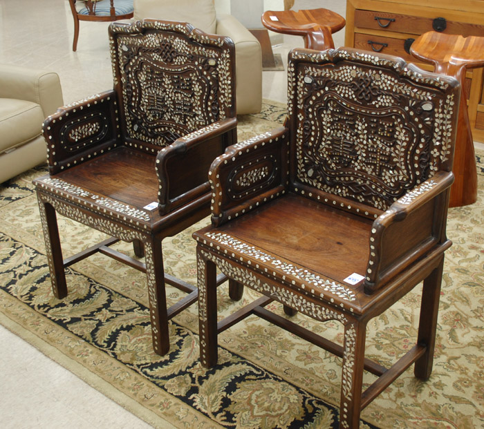 Appraisal: A PAIR OF CARVED AND MOTHER-OF-PEARL INLAID HONGMU ARMCHAIRS Chinese