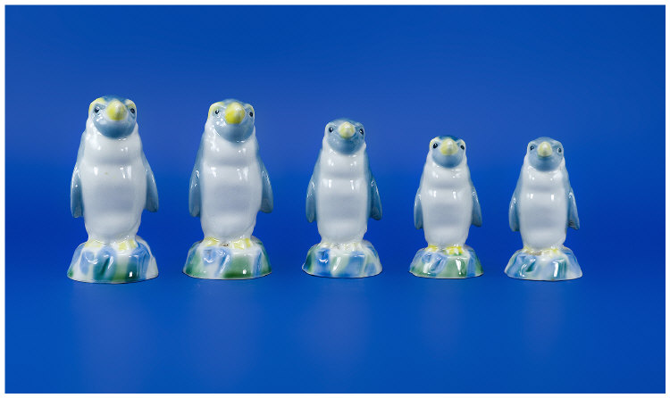 Appraisal: Wade Penguin Decanter Figures in total Range in height from