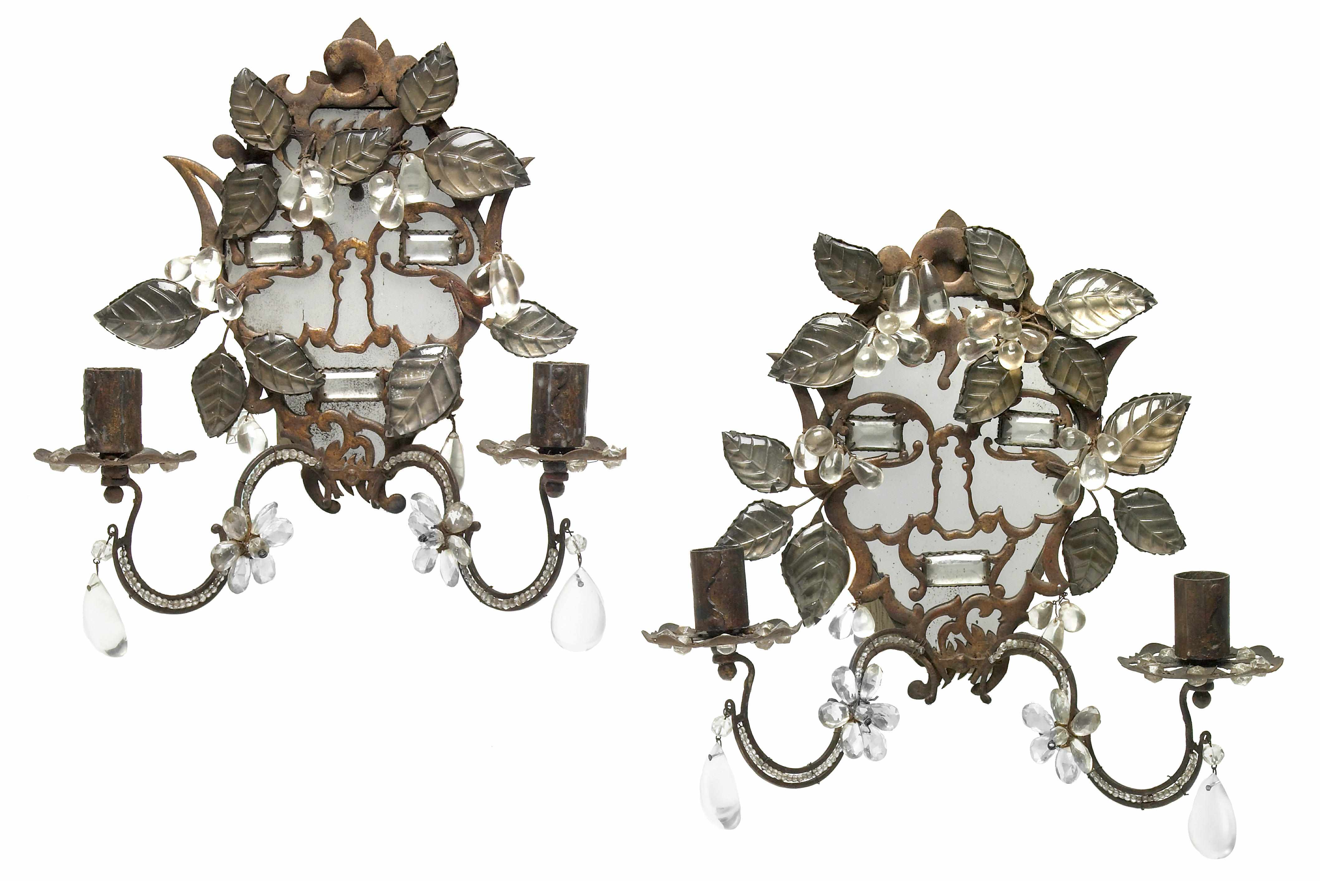 Appraisal: A pair of Bagues crystal and patinated metal two light