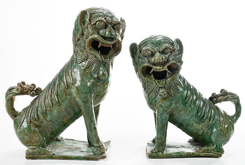 Appraisal: Pair Chinese Celadon Glazed Porcelain Foo Dogs hollow male and