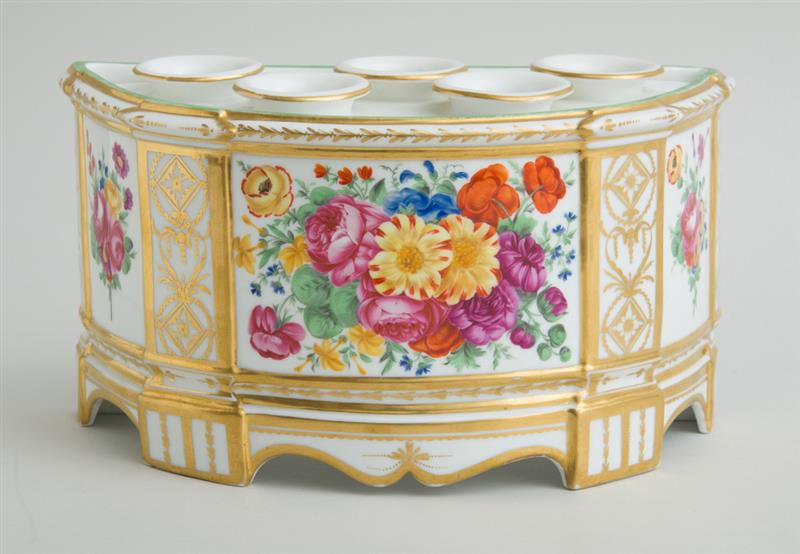 Appraisal: ENGLISH PORCELAIN DEMILUNE FLOWER HOLDER AND COVER With overglaze iron