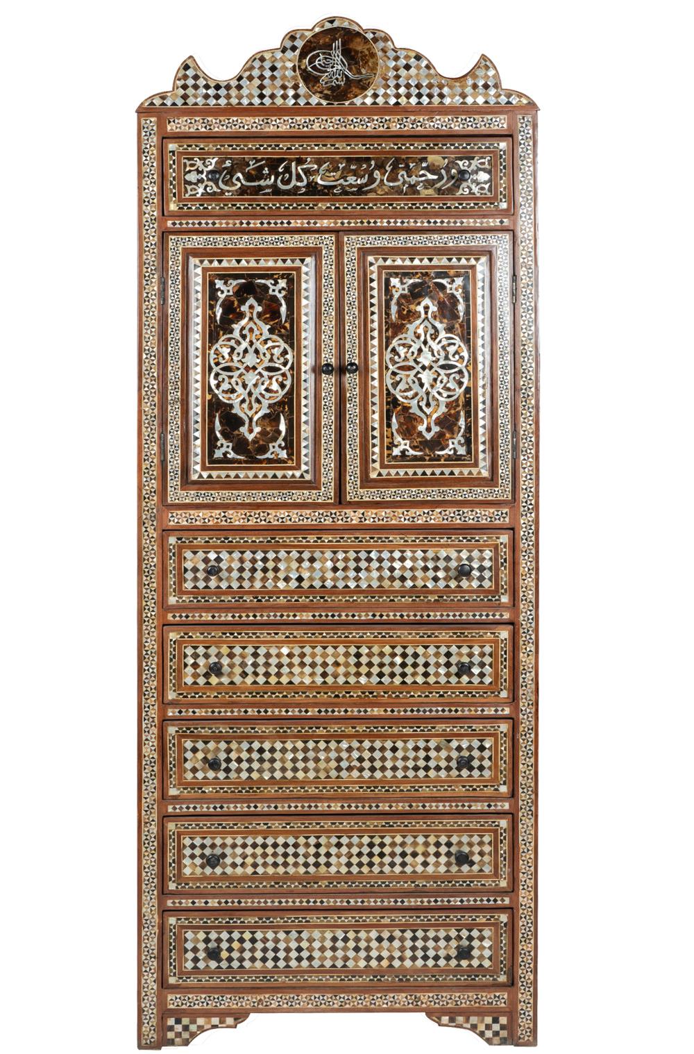 Appraisal: LEVANTINE-STYLE INLAID CABINET ON CHESTthe shaped pediment surmounting a drawer