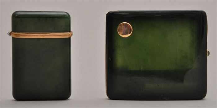 Appraisal: TWO GOLD-MOUNTED NEPHRITE CIGARETTE CASES Comprising a curved case with