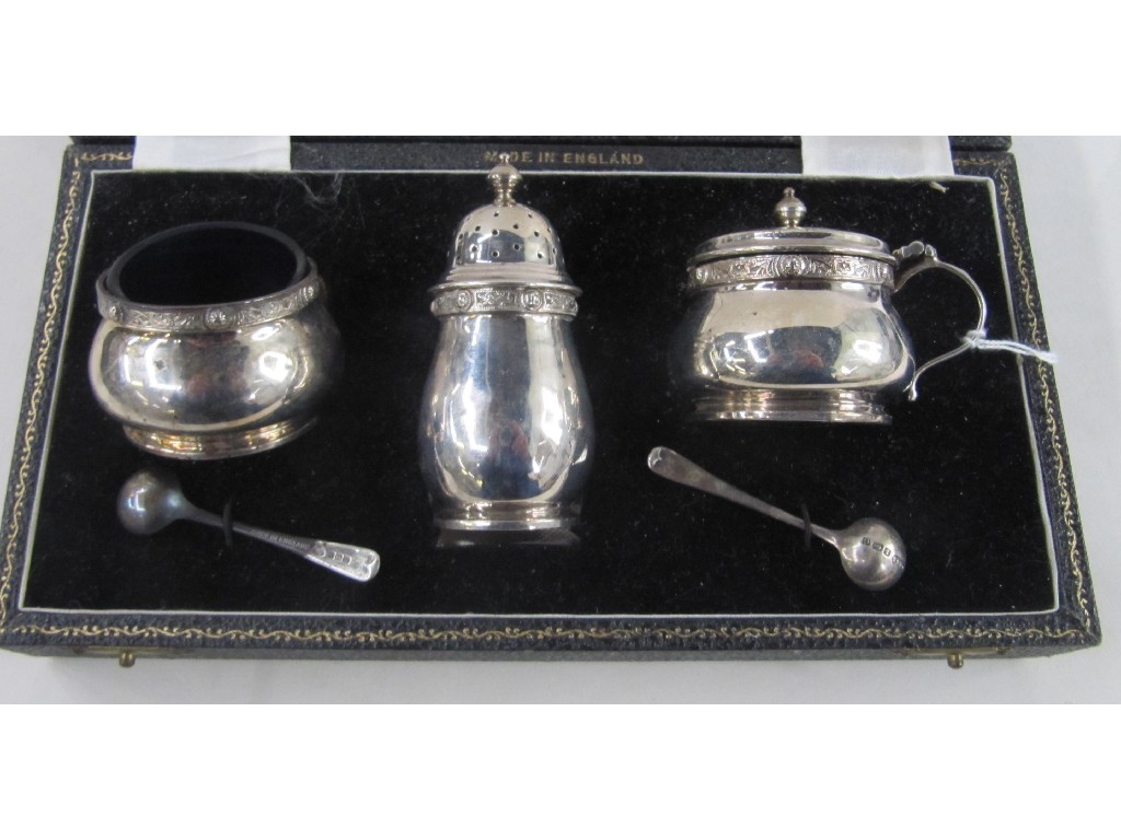 Appraisal: Cased three piece silver condiment set with Celtic motif Birmingham