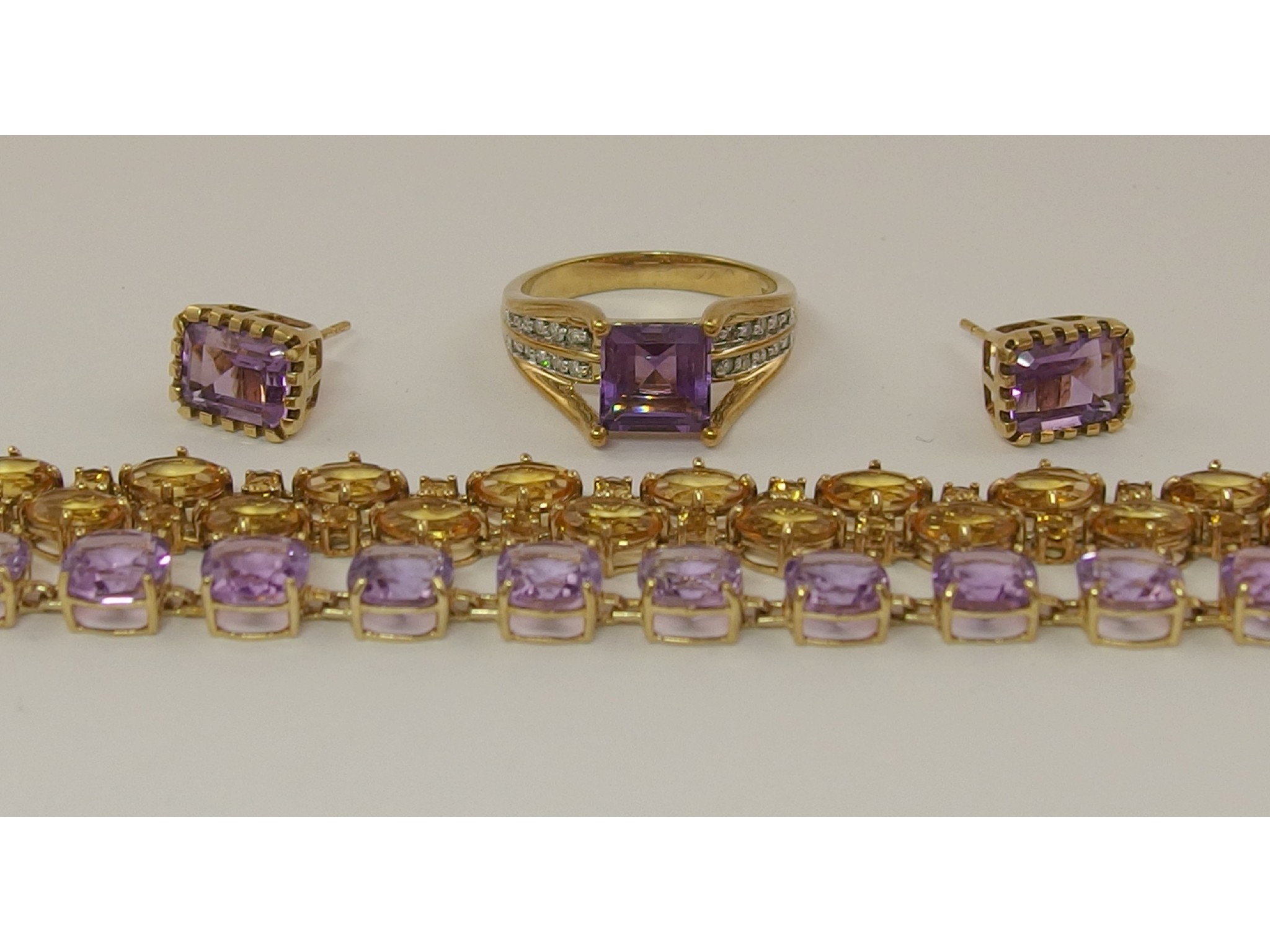 Appraisal: A ct amethyst and diamond suitecomprising of a bracelet of