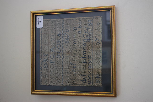 Appraisal: A TH CENTURY ALPHABET SAMPLER worked by 'Flora Appleby' worked