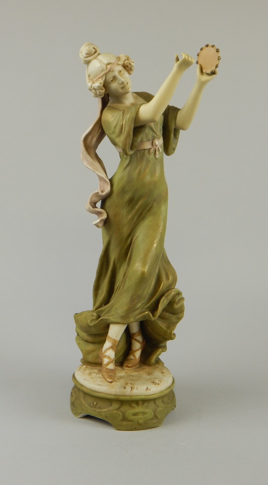 Appraisal: An early thC Royal Dux figure of a lady wearing