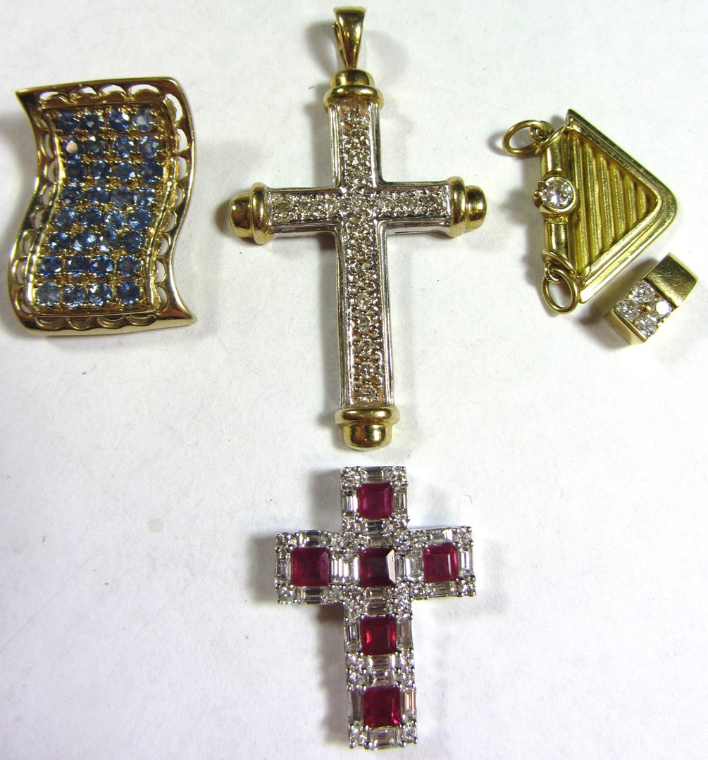 Appraisal: Five various pendants comprising an ct white gold ruby and