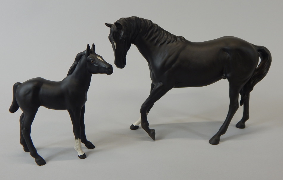 Appraisal: A Beswick matt black glazed ceramic horse with one white